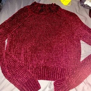 red soft h&m sweater, is slightly cropped with a bit of a turtleneck